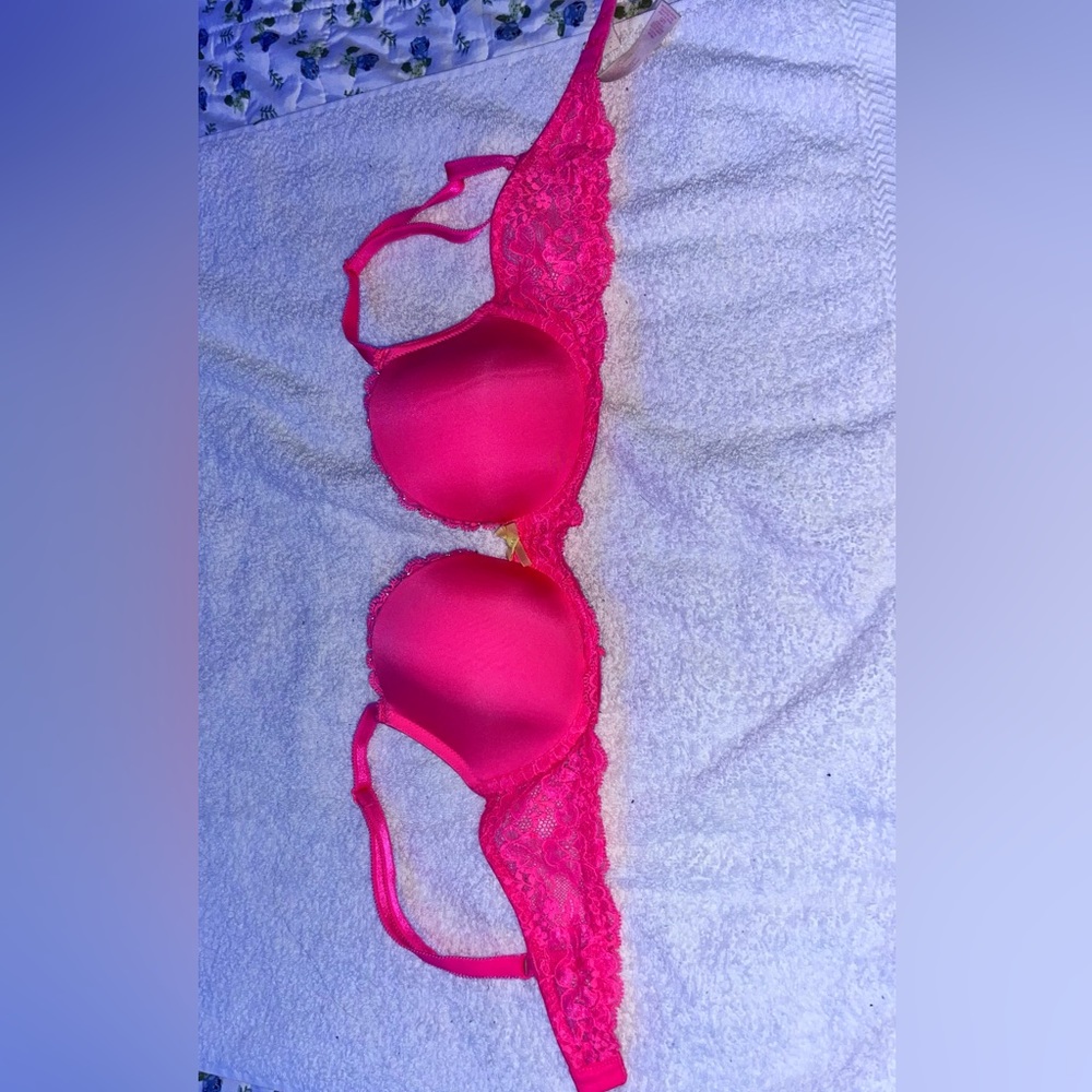 A lace hot pink, 32D bra from Victorious Secret.